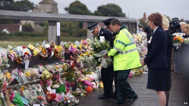 Sussex Chief Constable Giles York laid flowers near the crash site