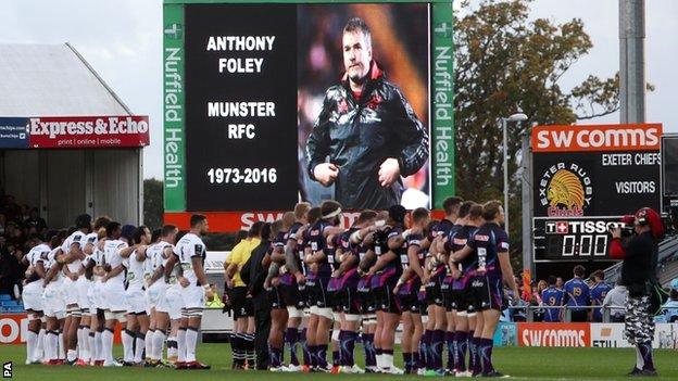 Exeter Chiefs and Clermont Auvergne respect a minute's silence for Munster coach Anthony Foley