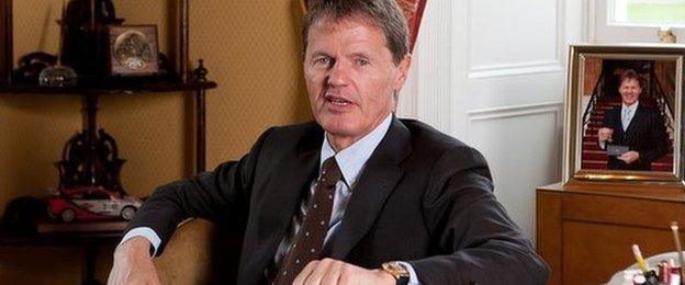 Malcolm Wilson OBE at his desk at Dovenby Hall