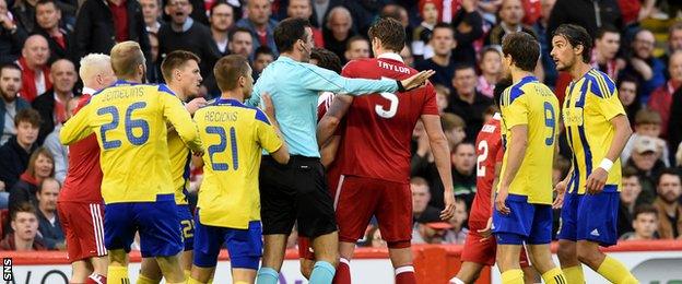 Ash Taylor (centre) was booked