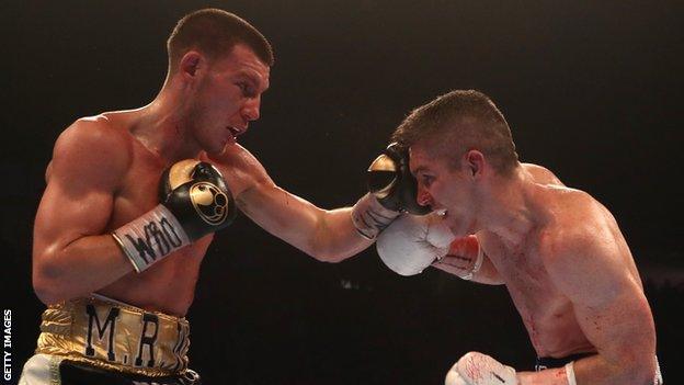 Liam Williams (left) punches Liam Smith