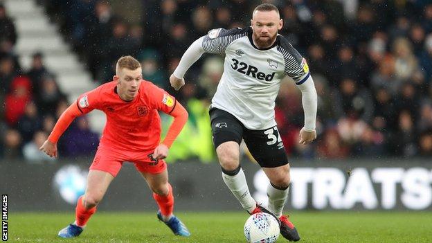Wayne Rooney in action for Derby County against Huddersfield Town