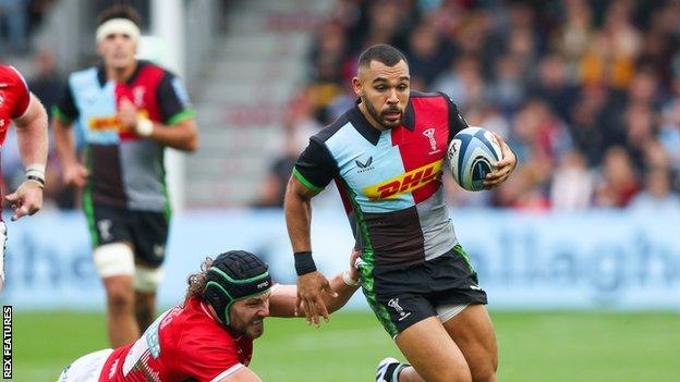 Joe Marchant evades a tackle for Harlequins