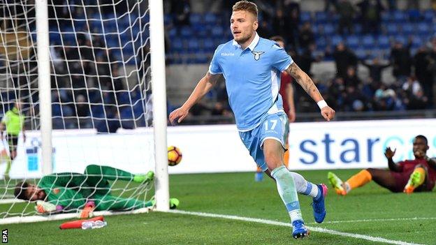 Lazio's Ciro Immobile celebrates after scoring against Roma