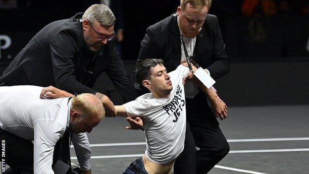 Protester taken off court at the Laver Cup