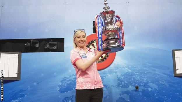 Fallon Sherrock with trophy