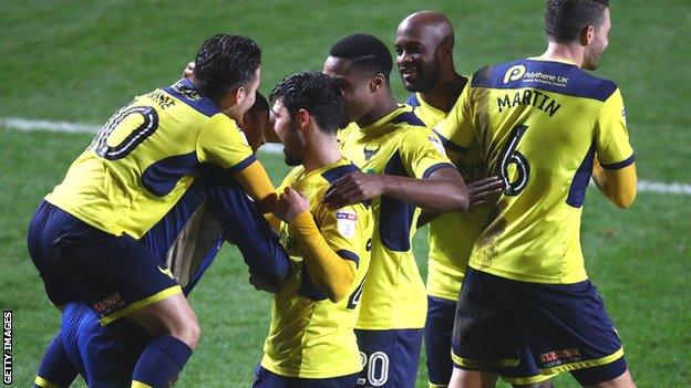 Oxford celebrate their Checkatrade Trophy win over Charlton on Tuesday