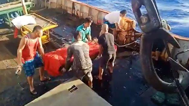 Video of body being thrown into the sea