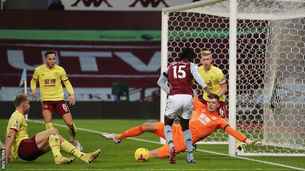 Aston Villa"s Bertrand Traore shoots at goal in the Premier League match against Burnley