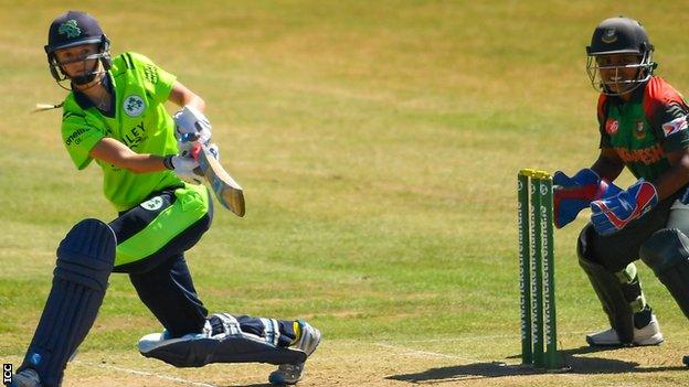 Gaby Lewis plays a shot in her 36 from 33 balls against Papua New Guinea on Thursday