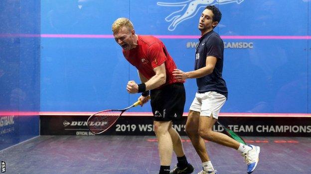 Wales' Joel Makin celebrates on his way to beating reigning world champion Tarek Momen of Egypt