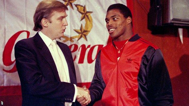 USFL team New Jersey Generals owner Donald Trump, shakes hands with star player Herschel Walker