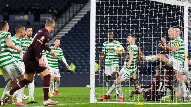 Hearts' Stephen Kingsley scores against Celtic