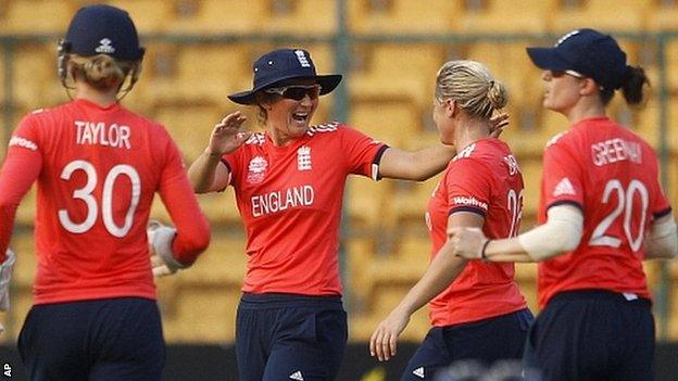 England celebrate a wicket