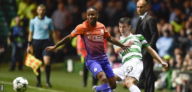 Kieran Tierney gets the ball away from Manchester City's Raheem Sterling