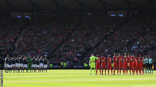 England and Scotland players line up before their World Cup qualifier in June 2017