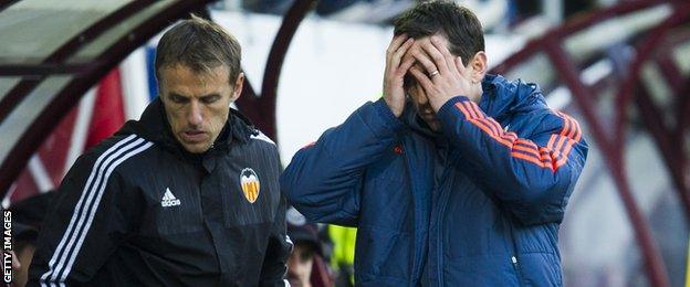 Gary Neville with brother and Valencia assistant coach Phil Neville