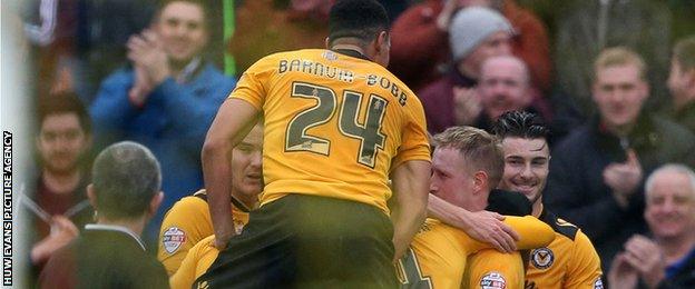 Newport celebrate taking the lead against Plymouth Argyle