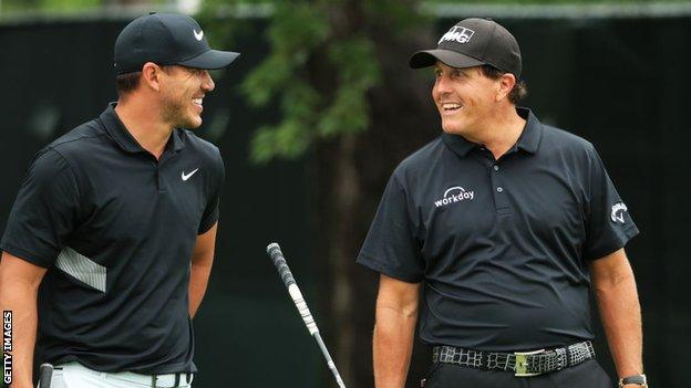 Brooks Koepka and Phil Mickelson