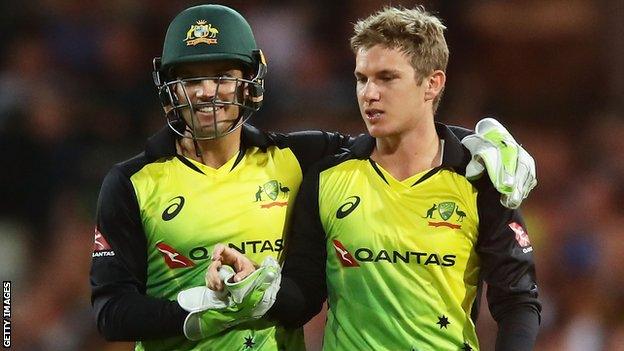 Adam Zampa (right) celebrates a wicket for Australia's T20 side