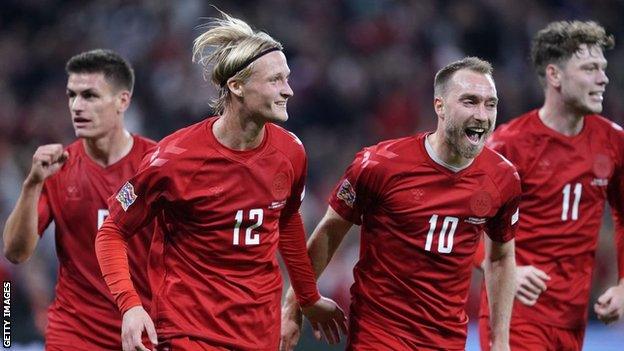 Kasper Dolberg celebrates his goal with Christian Eriksen