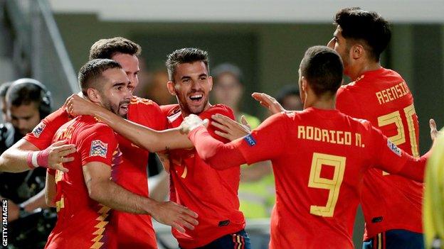 Spain players celebrate Saul Niguez's opening goal