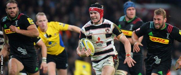 Jamie Roberts and Chris Robshaw chase Gloucester's Rob Cook