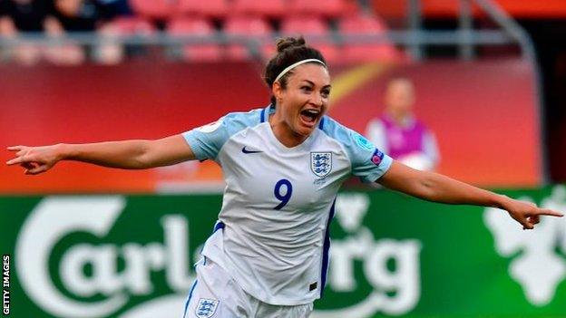 Jodie Taylor celebrates scoring against Scotland