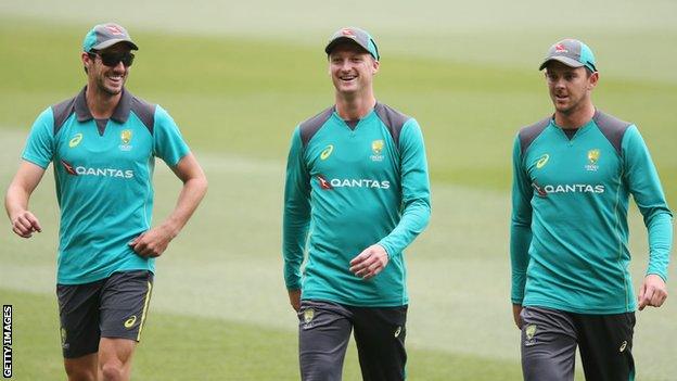 Jackson Bird (c) walks off with Pat Cummins (L) and Josh Hazlewood