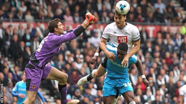 Chris Martin heads his second goal in Derby County's 4-2 win over Wolves