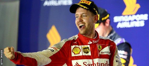 Sebastian Vettel celebrates winning in Singapore in 2015