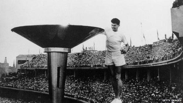 Ron Clarke of Australia lights the Olympic Torch at the opening ceremony of the 17th Olympic Games held in Melbourne during 1956