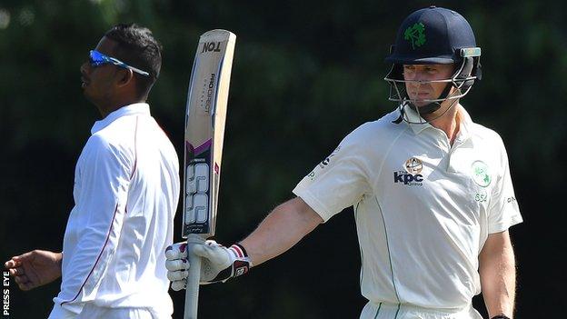 William Porterfield acknowledges applause after reaching his 50 at Stormont