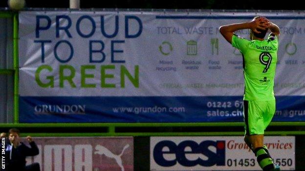 A sign at Forest Green says 'Proud to be Green'