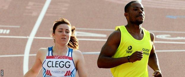 Libby Clegg and guide runner Mikail Huggins