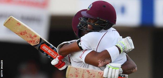 John Campbell and Kraigg Brathwaite celebrate