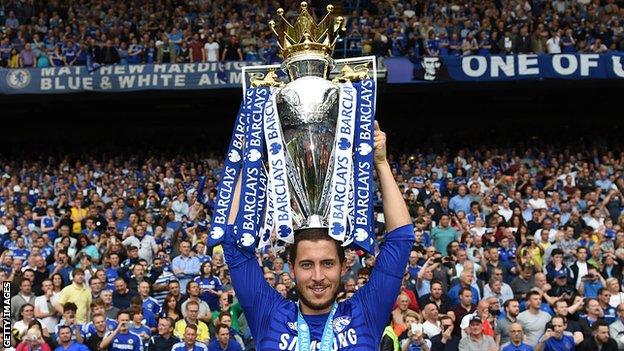 Eden Hazard lifts the 2016-17 Premier League trophy