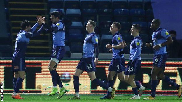 Wycombe players celebrate