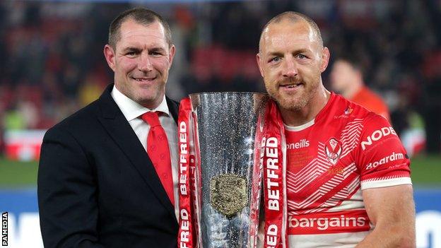 St Helens coach Kristian Woolf and captain James Roby with the Super League trophy