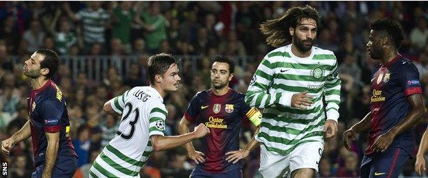 Georgios Samaras jogs off to celebrate opening the scoring for Celtic in Barcelona