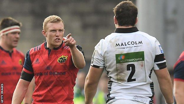 Munster's Keith Earls points the finger at Glasgow hooker Fraser Brown