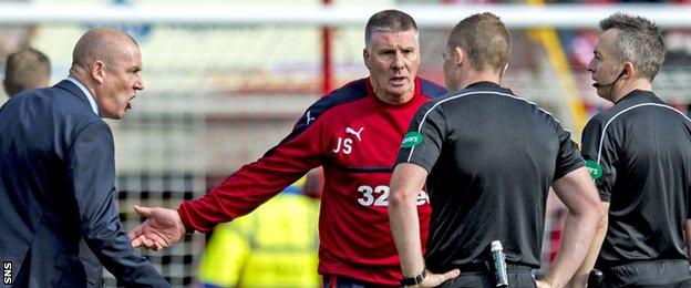 Rangers manager Mark Warburton and goalkeeping coach Jim Stewart remonstrate with the match officials at Pittodrie