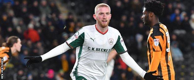 Oliver McBurnie celebrates for Barnsley against Hull City