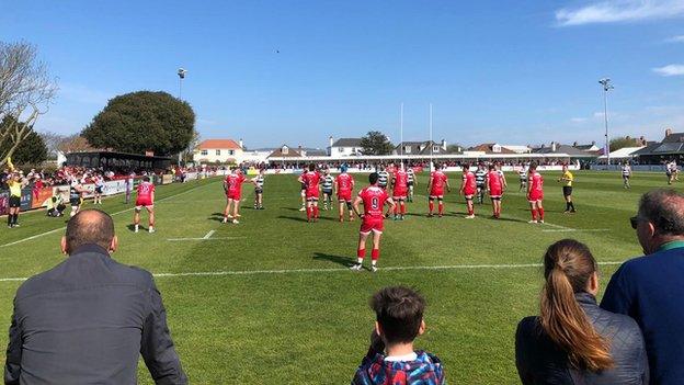 Crowds attend a Jersey Reds match