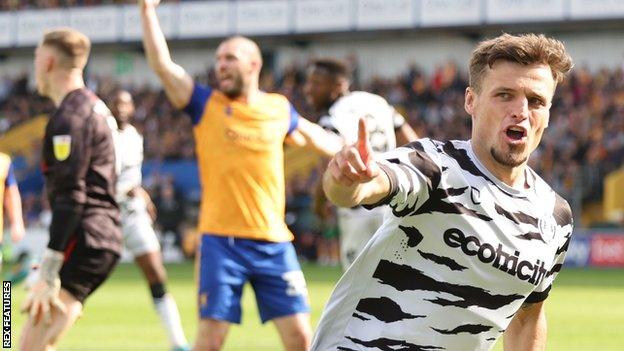 Josh March celebrates his goal for Forest Green Rovers against Mansfield