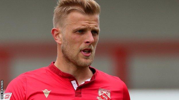 Harry Davis in action for Morecambe