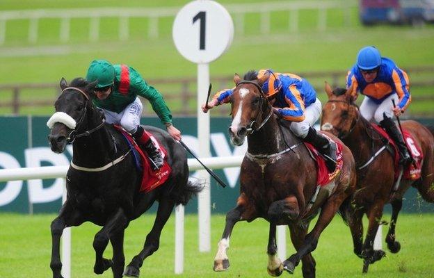 Harzand goes clear of his rivals in the Irish Derby