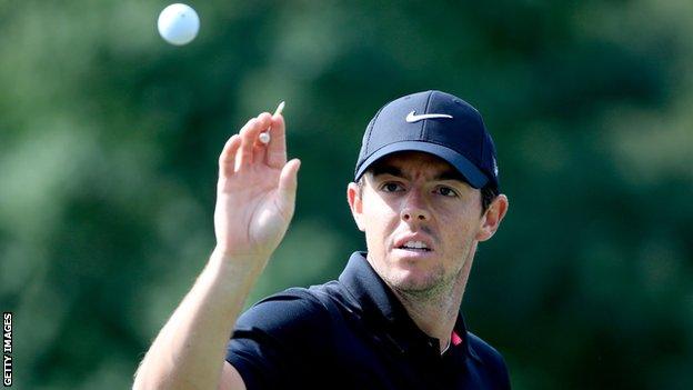 Rory McIlroy is about to catch a ball during his practice round in Atlanta on Wednesday