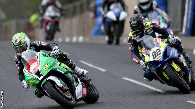 Derek McGee leads Derek Sheils at the Cookstown 100 last year