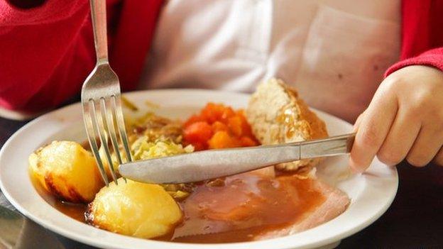 Child eating a school dinner